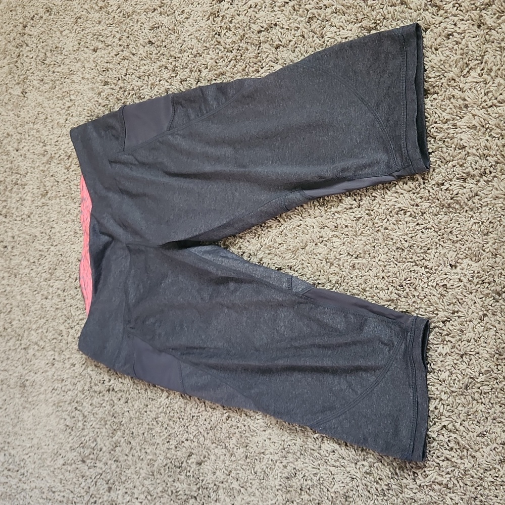 Tangerine Capri Leggings with Side Pockets and Mesh Detail